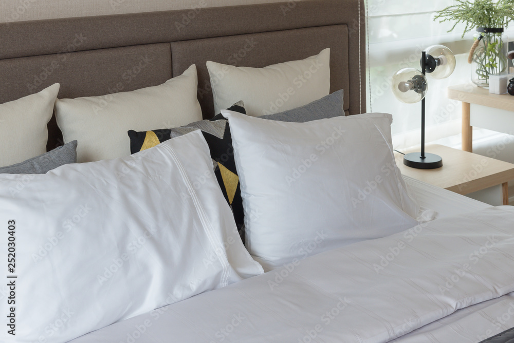 white pillows on bed white pillows on bed