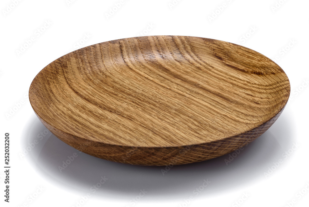 One round wooden bowl on white background. Isolate One round wooden bowl on white background. Isolate