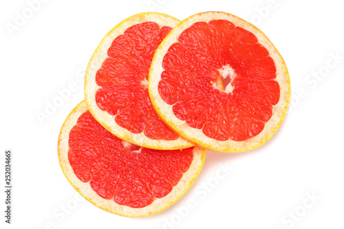 healthy food. sliced grapefruit isolated on white background. top view