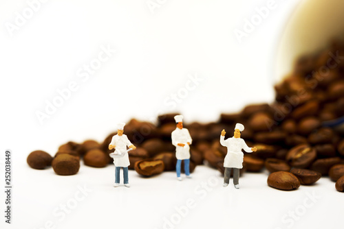 Miniature people: Group of chef standing with coffee bean and cup of coffee. Coffee time concept