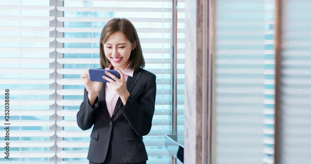 asian business woman play phone asian business woman play phone