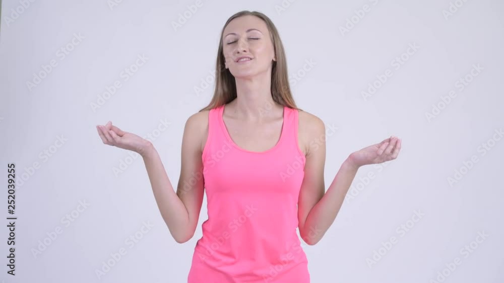 Portrait of happy blonde woman relaxing with eyes closed
