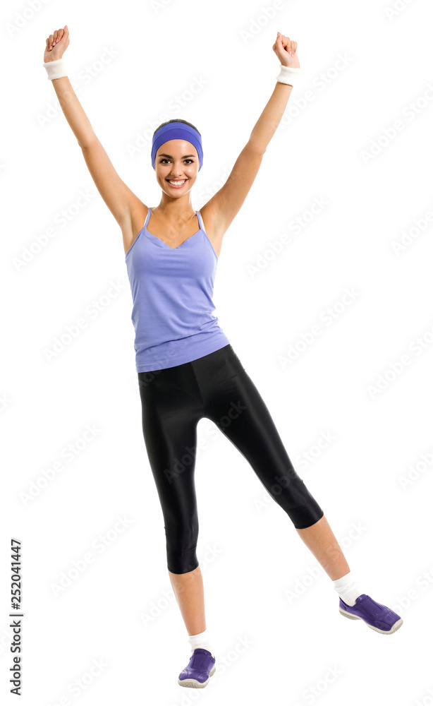 happy smiling woman jumping or doing fitness aerobics exercise, isolated