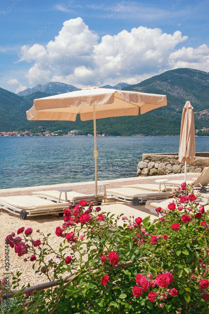 Summer beach vacation.  Montenegro, Adriatic Sea, view of Bay of Kotor near Tivat city