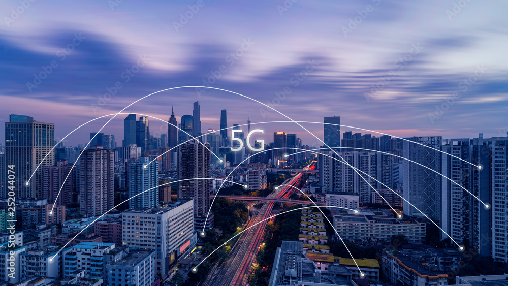 5G network wireless systems and internet of things with modern city skyline