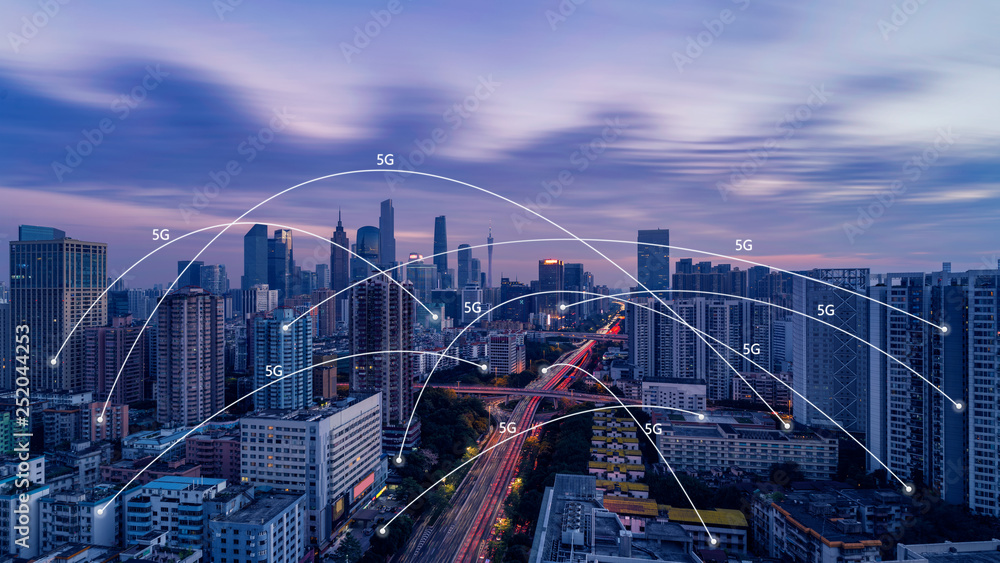 5G network wireless systems and internet of things with modern city skyline