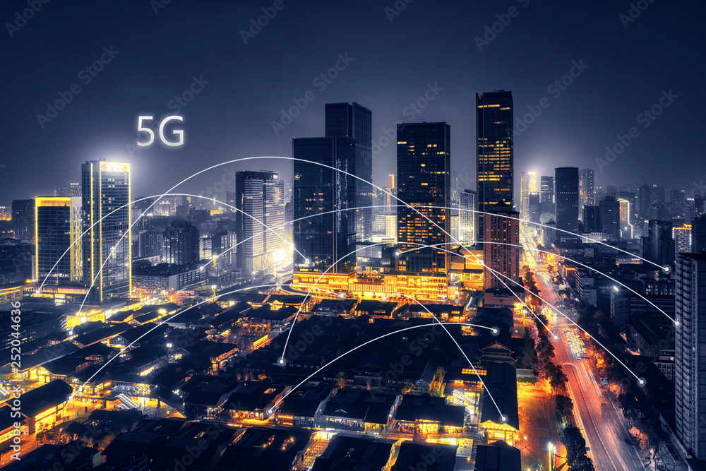 5G network wireless systems and internet of things with modern city skyline