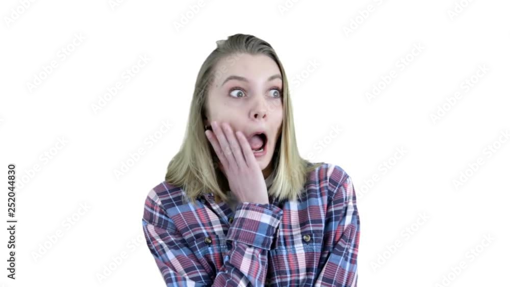 Shocked and surprised girl screaming and looking camera on white background. Expressive facial expressions Shocked and surprised girl screaming and looking camera on white background. Expressive facial expressions