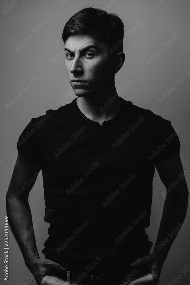 Fashion male model. Portrait man concept. Close-up portrait of serious man model. Fashion male model. Portrait man concept. Close-up portrait of serious man model.
