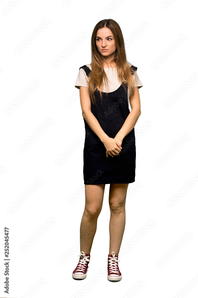 Full body Young pretty woman feeling upset on isolated background Full body Young pretty woman feeling upset on isolated background