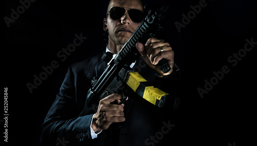 Bodyguard with machine gun