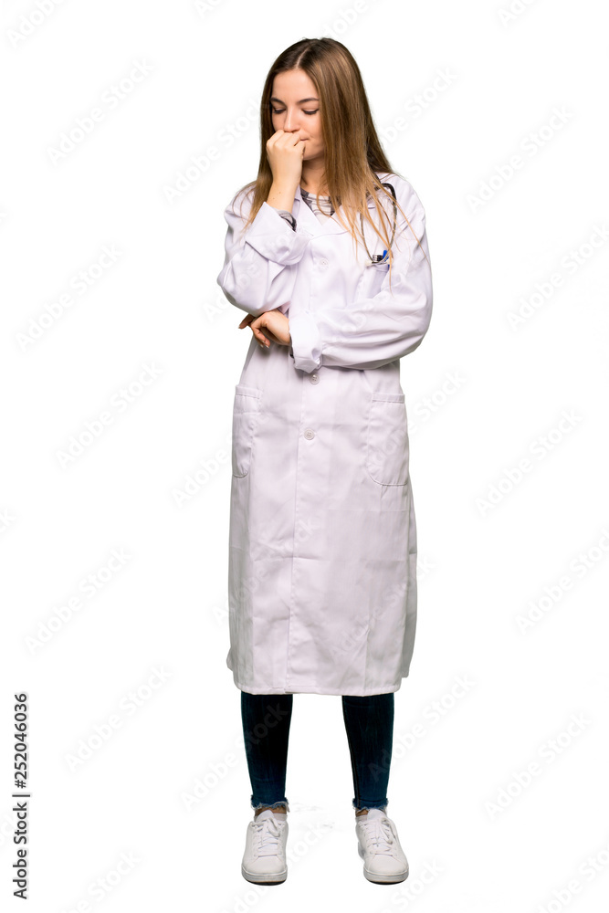 Full body Young doctor woman having doubts on isolated background Full body Young doctor woman having doubts on isolated background