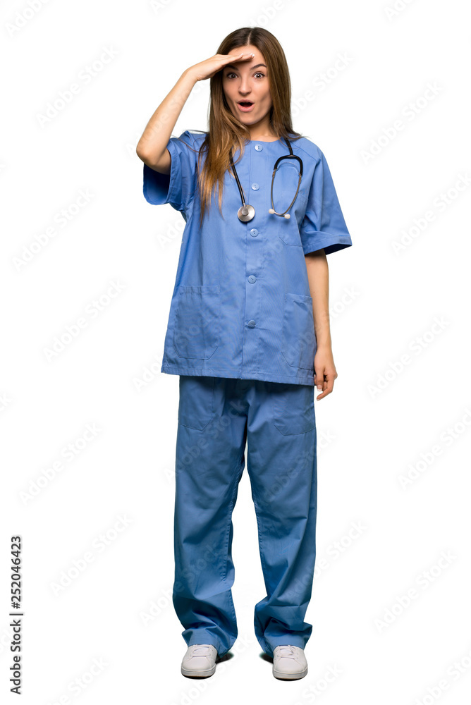 Full body Young nurse has just realized something and has intending the solution on isolated background Full body Young nurse has just realized something and has intending the solution on isolated background