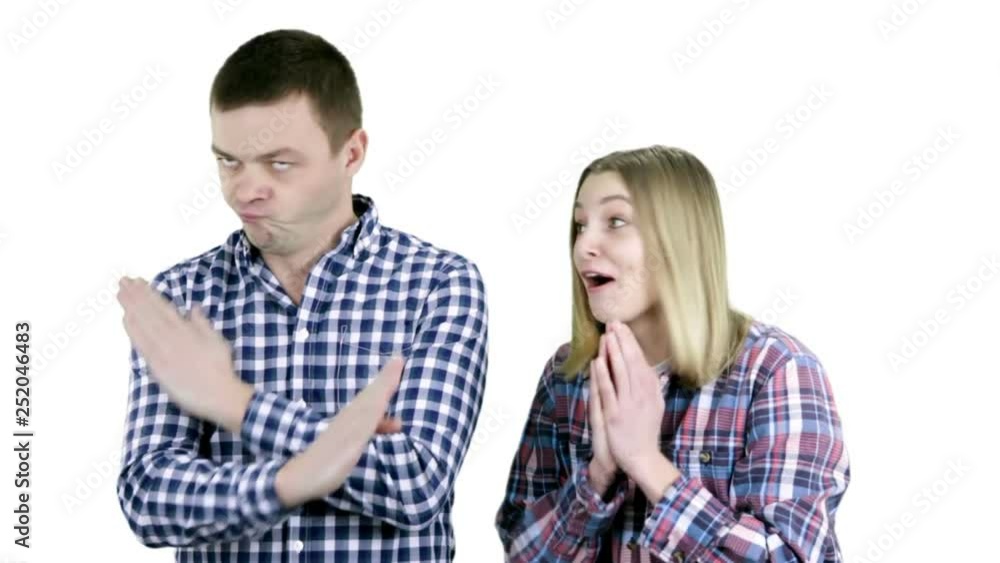 Young woman asking her husband about something Young woman asking her husband about something