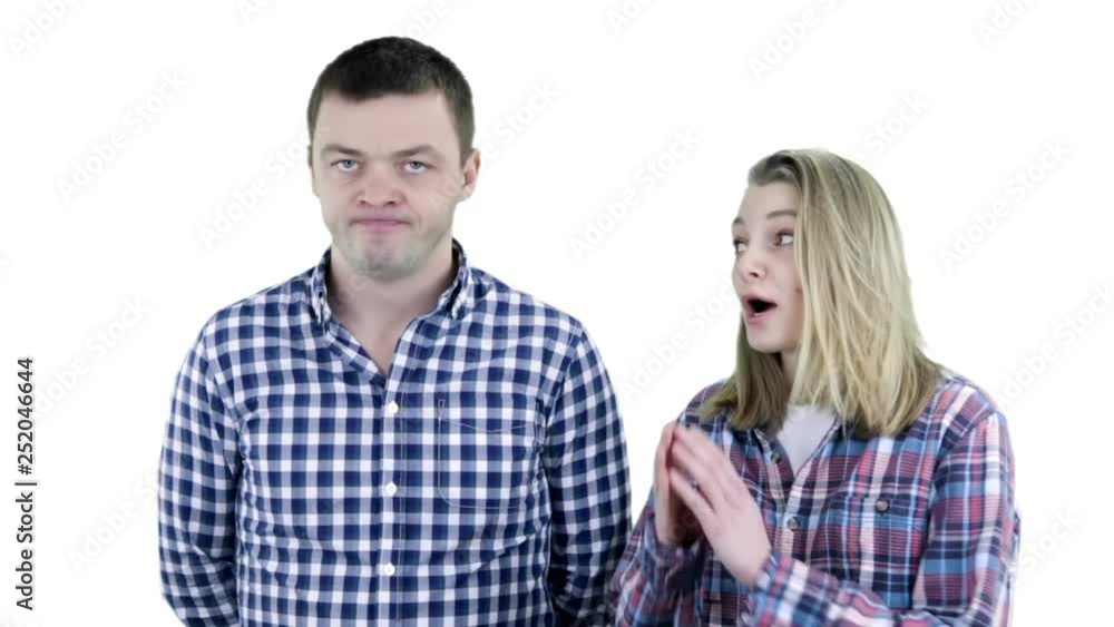 Young woman asking her husband about something Young woman asking her husband about something