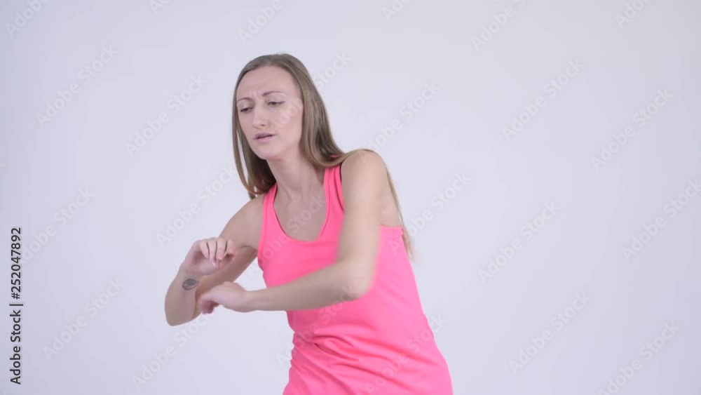 Portrait of stressed blonde woman having back pain Portrait of stressed blonde woman having back pain