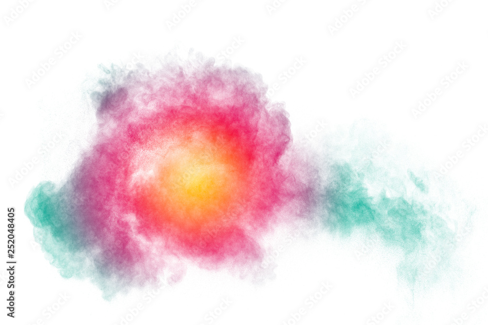 Multicolored powder explosion on white background. Color dust splash cloud on background. Launched colorful particles on background.