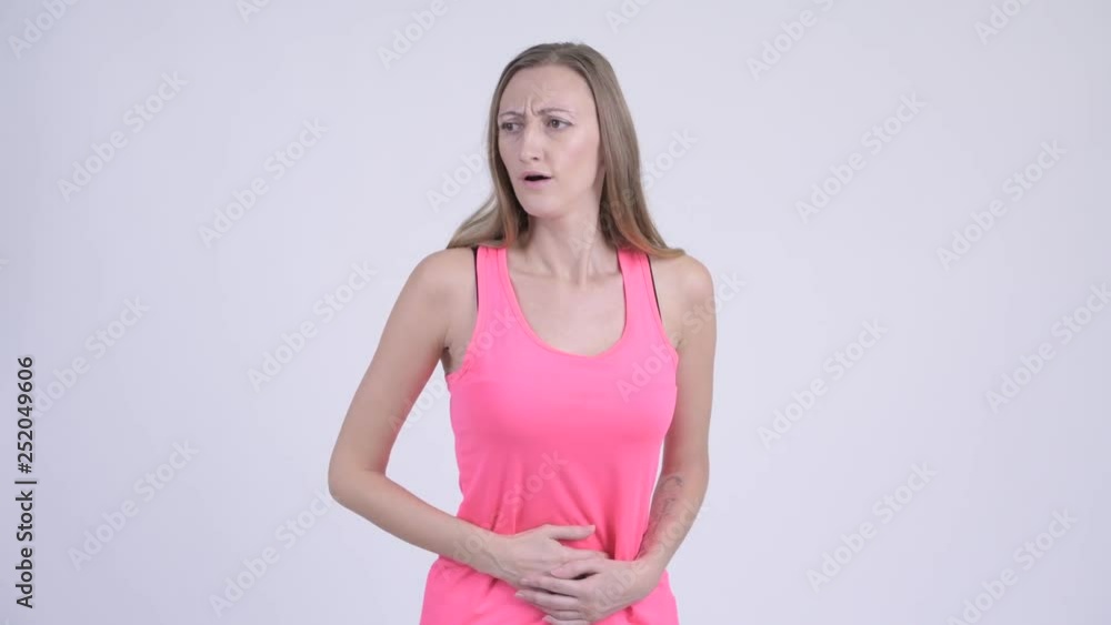 Portrait of stressed blonde woman having stomach ache Portrait of stressed blonde woman having stomach ache