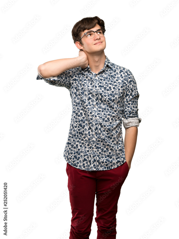 Teenager man with flower shirt and glasses thinking an idea while scratching head over isolated white background Teenager man with flower shirt and glasses thinking an idea while scratching head over isolated white background