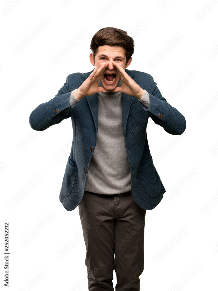 Teenager man with turtleneck shouting and announcing something over isolated white background Teenager man with turtleneck shouting and announcing something over isolated white background