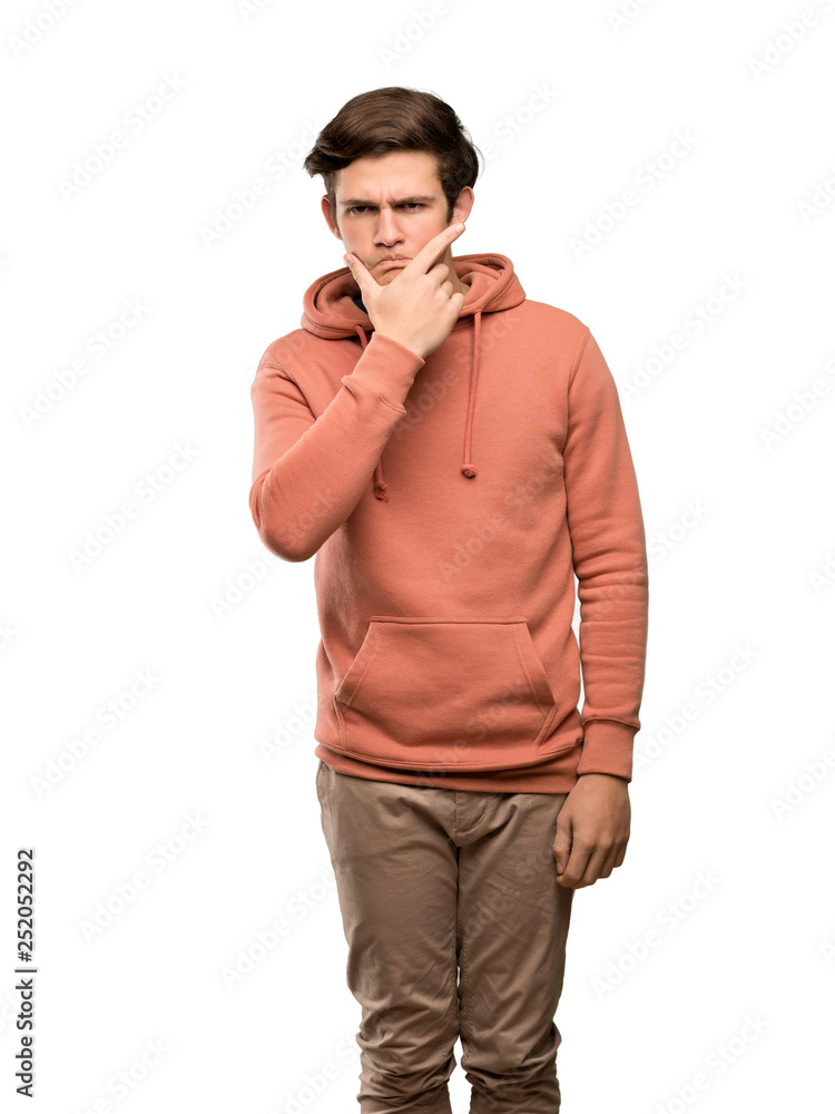 Teenager man with sweatshirt thinking over isolated white background Teenager man with sweatshirt thinking over isolated white background