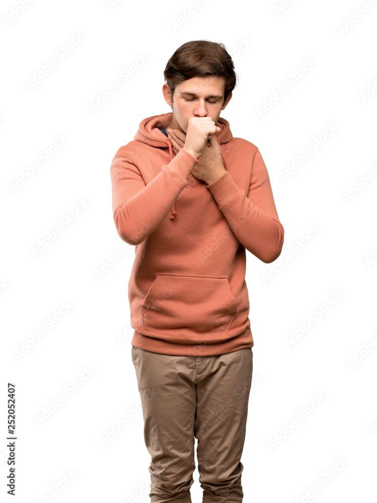 Teenager man with sweatshirt is suffering with cough and feeling bad over isolated white background Teenager man with sweatshirt is suffering with cough and feeling bad over isolated white background