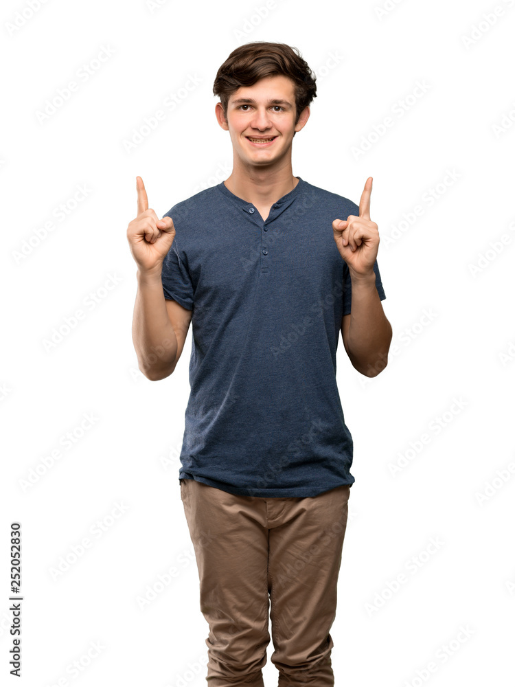 Teenager man pointing with the index finger a great idea over isolated white background Teenager man pointing with the index finger a great idea over isolated white background