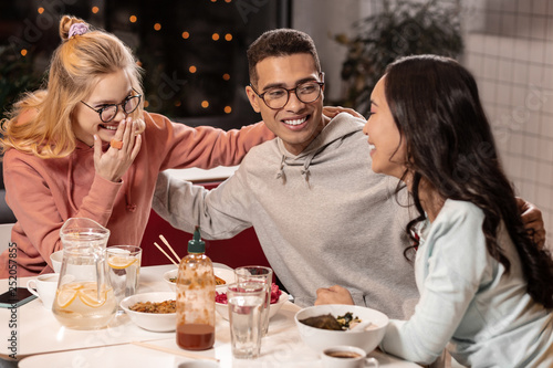 Multiracial company deciding to be friends after graduation.