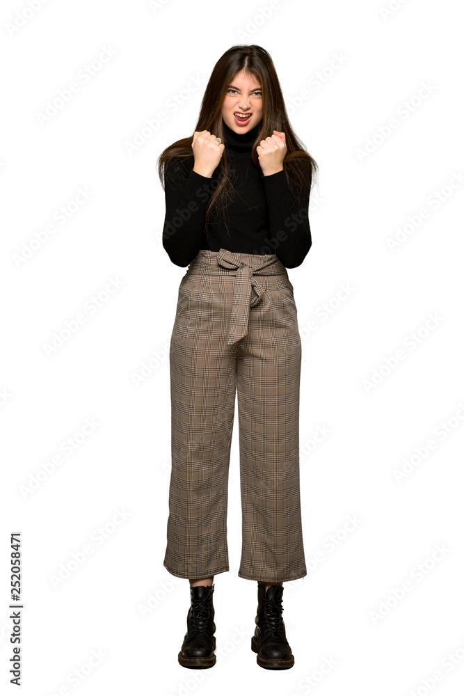 Full-length shot of Pretty girl frustrated by a bad situation on isolated white background Full-length shot of Pretty girl frustrated by a bad situation on isolated white background