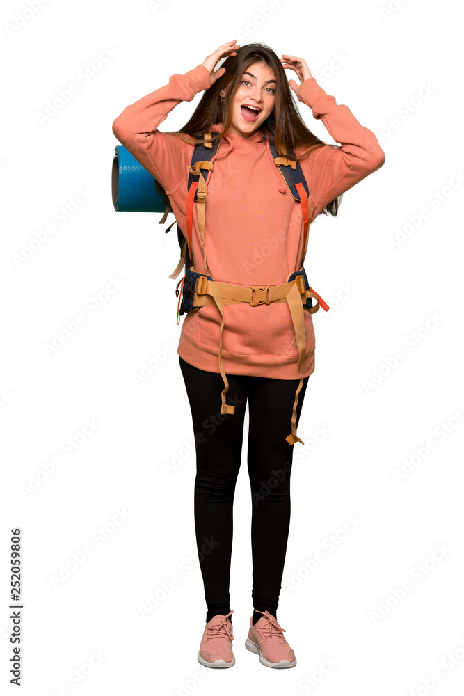 Full-length shot of Hiker girl with surprise and shocked facial expression on isolated white background Full-length shot of Hiker girl with surprise and shocked facial expression on isolated white background