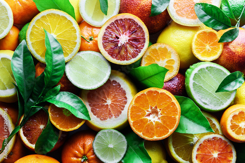 Tableau sur toile Mix of different citrus fruits closeup