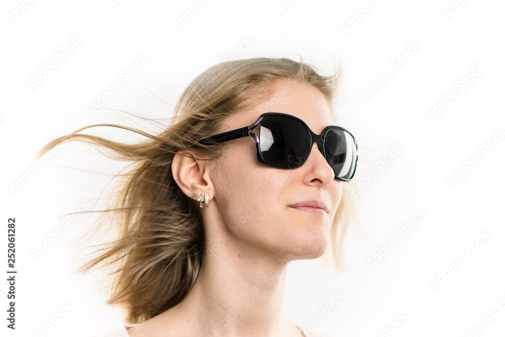 face of a pretty girl blonde in sunglasses close-up on a white background face of a pretty girl blonde in sunglasses close-up on a white background