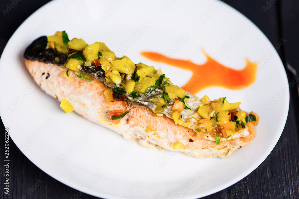 red fish salmon grilled with vegetables and sweet and sour sauce red fish salmon grilled with vegetables and sweet and sour sauce