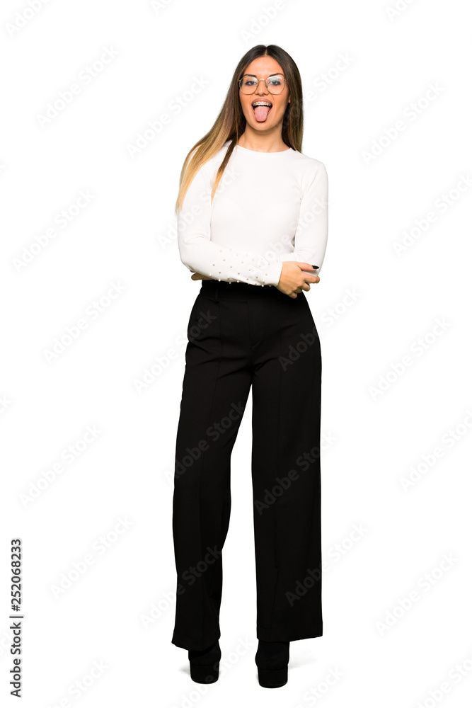 Full body of Pretty woman with glasses showing tongue at the camera having funny look Full body of Pretty woman with glasses showing tongue at the camera having funny look