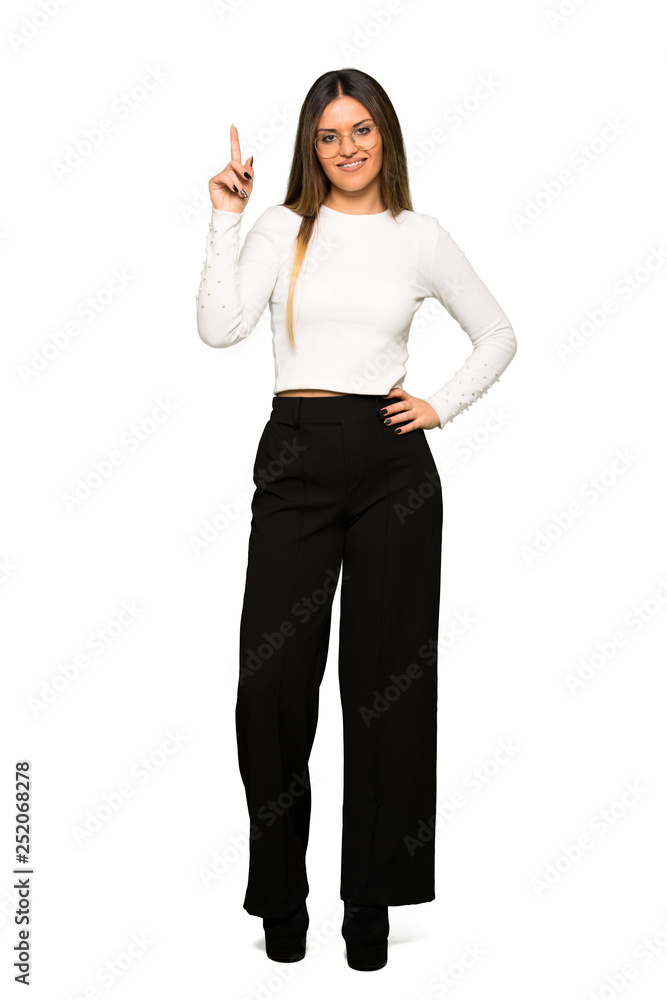 Full body of Pretty woman with glasses showing and lifting a finger in sign of the best Full body of Pretty woman with glasses showing and lifting a finger in sign of the best