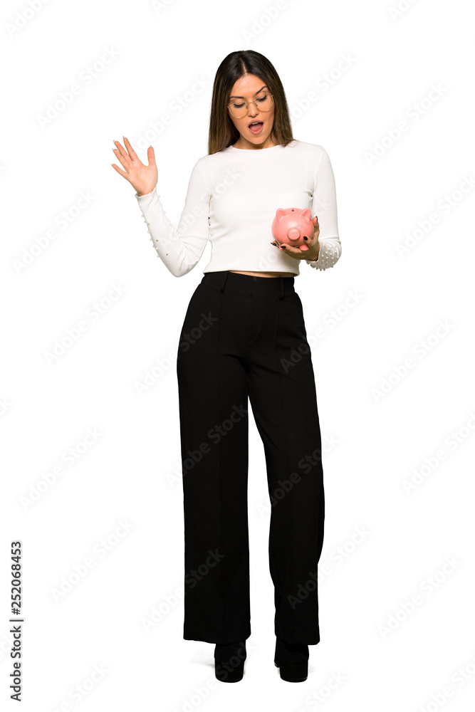 Full body of Pretty woman with glasses holding a big piggybank Full body of Pretty woman with glasses holding a big piggybank