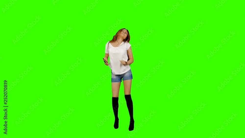 Wonderful funny girl dancing club music at green-screen shot Wonderful funny girl dancing club music at green-screen shot