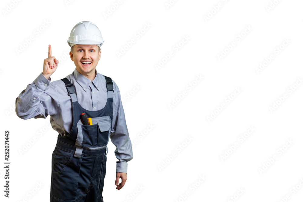 Cheerful builder pointing up his finger as new idea concept. Isolated. Cheerful builder pointing up his finger as new idea concept. Isolated.