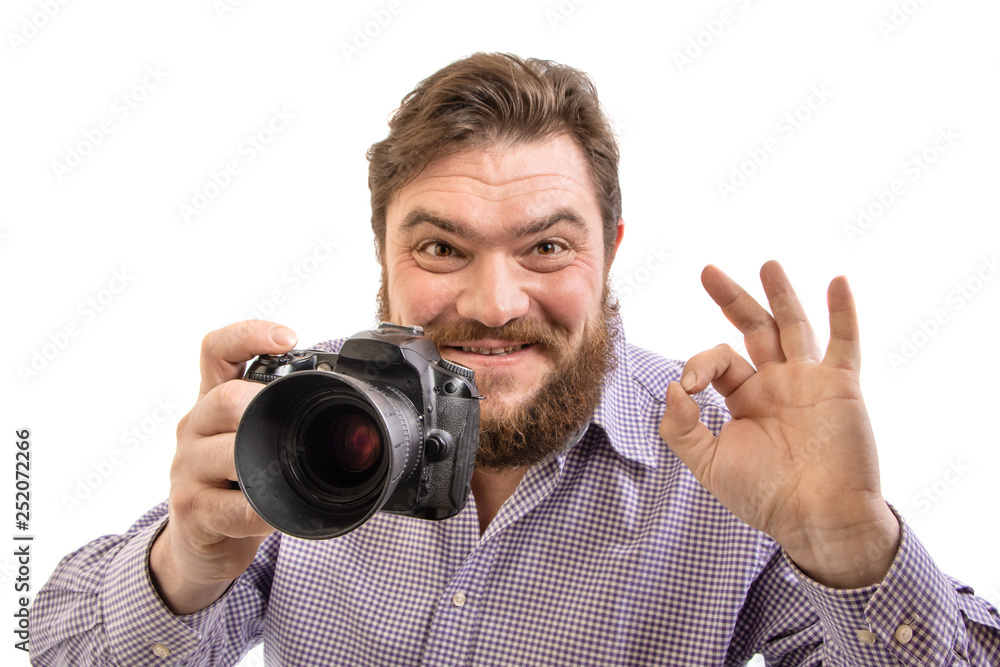 portrait of big handsome bearded photographer taking photo with professional DSLR camera, isolated on white portrait of big handsome bearded photographer taking photo with professional DSLR camera, isolated on white