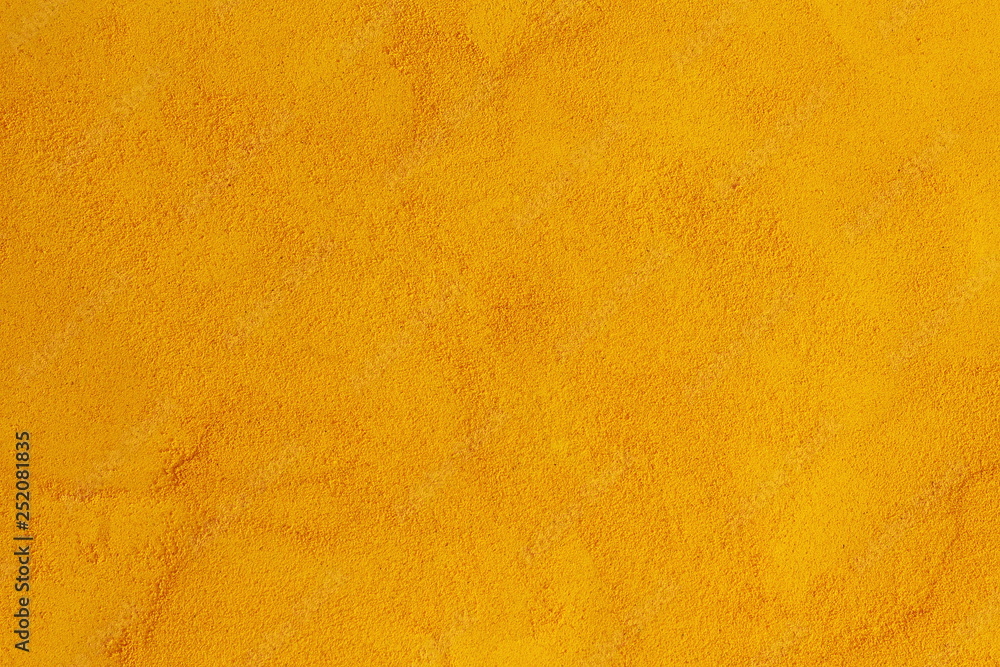 turmeric or curcumin longa powder isolated as herb or spice texture yellow food background - obrazy, fototapety, plakaty 