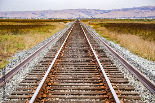Railroad tracks across marshland, Alviso, San Jose, south San Francisco bay area, California