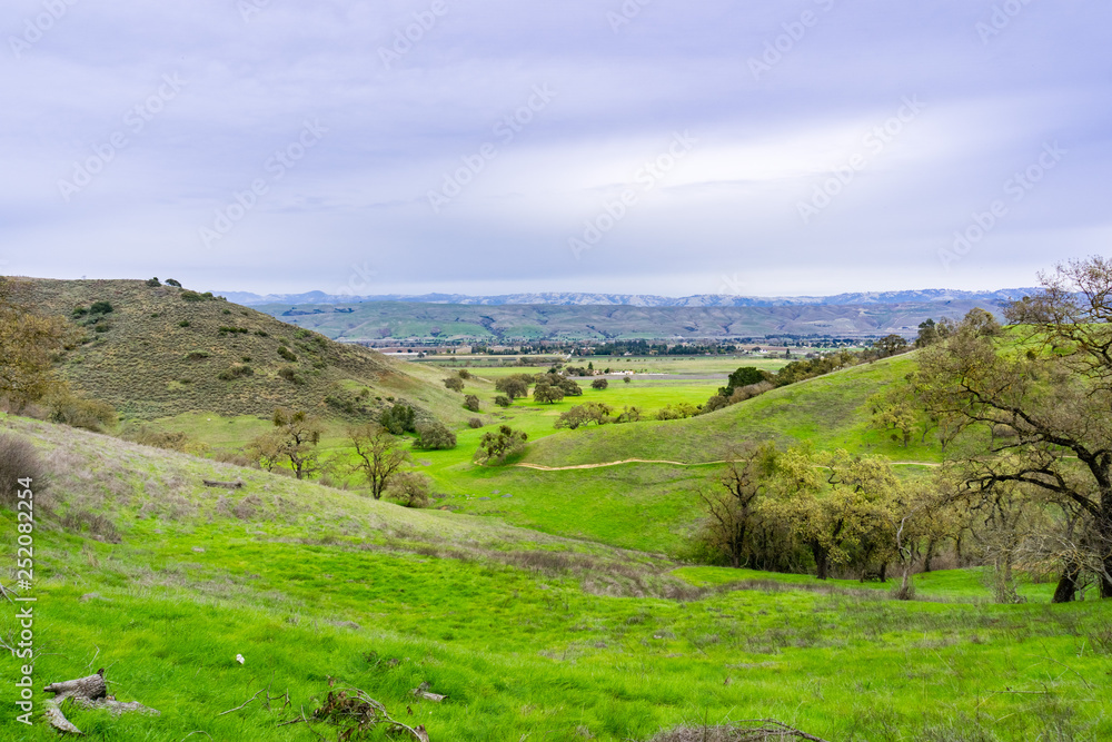 Panoramic view over the hills and valley of Coyote Valley Open Space Preserve, Morgan Hill, south San Francisco bay area, California Panoramic view over the hills and valley of Coyote Valley Open Space Preserve, Morgan Hill, south San Francisco bay area, California