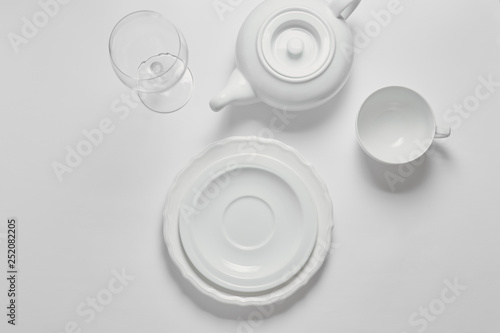 Set of clean dishes on white background top view copyspace