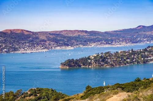 Ships sail in Belvedere Cove on a clear Autumn day, San Francisco bay, California