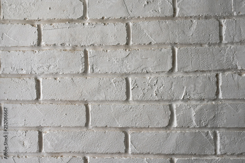 Seamless design vintage style in natural light ancient cream beige yellow brown brick wall textured background. white brick wall, texture of whitened masonry as a background