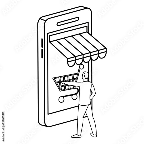 young man using smartphone with shopping cart