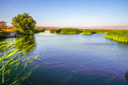 Ponds at sunset in Coyote Hills Regional Park, San Francisco Bay Area, California photo