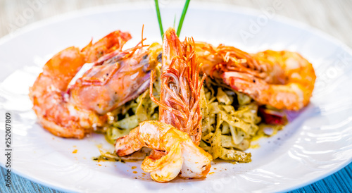 Fine dining organic food pasta with prawns and mussel seafood