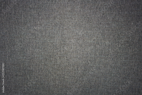 Texture of woven coarse-knit fabric. with blackout edges background