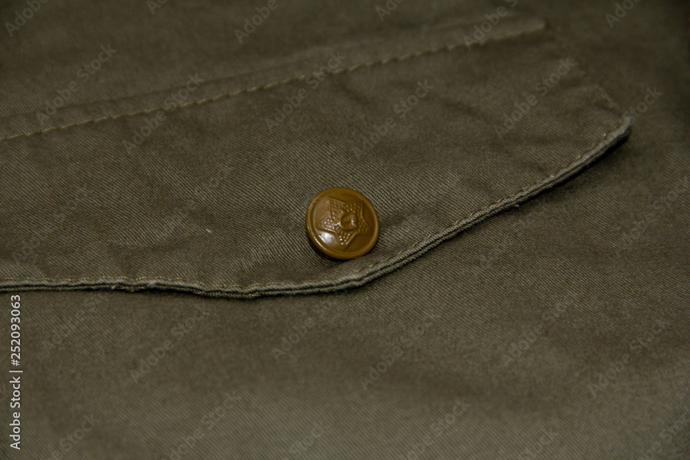 Pocket on the tunic of a Soviet soldier with a star on the button. Pocket on the tunic of a Soviet soldier with a star on the button.
